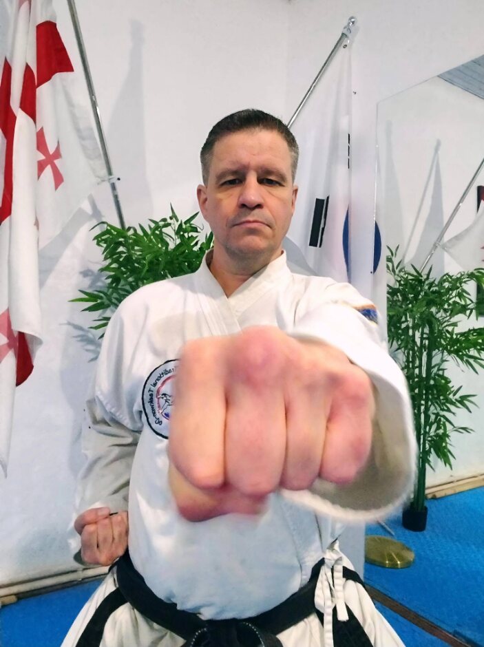 Instructor Kai Hacker demonstrating a punch